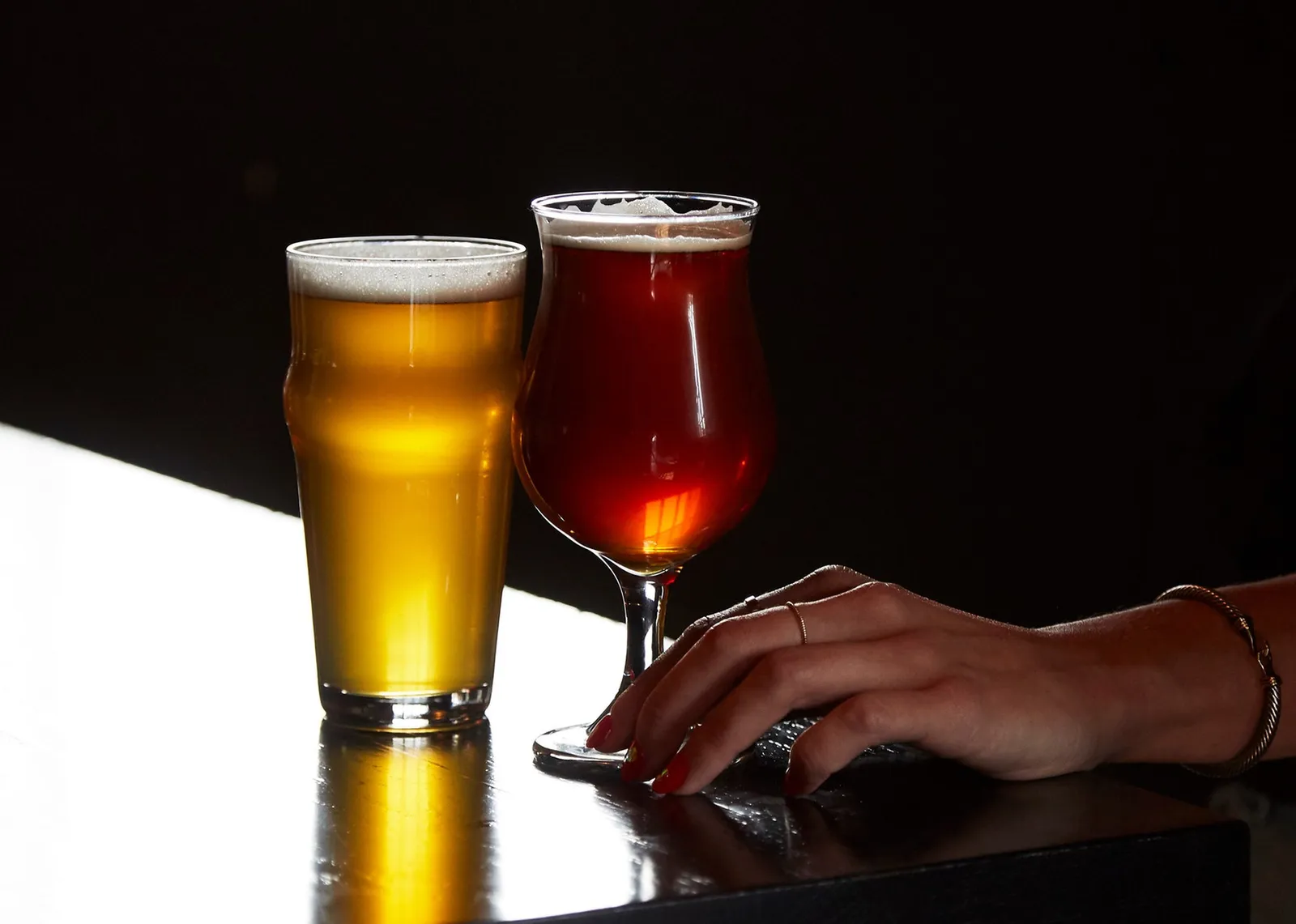 Two beers in the window light