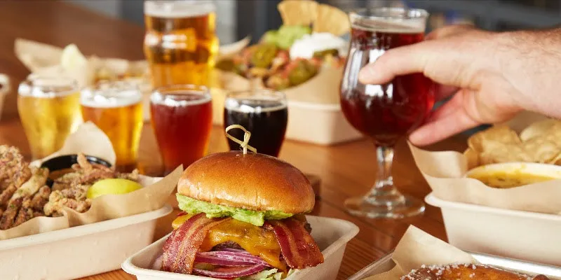 Burgers, tacos and beer on the bar